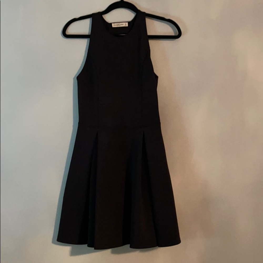 Black skater dress with back cutouts